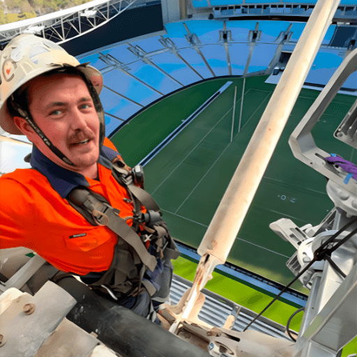 CSI riggers working at height inside Accor Stadium